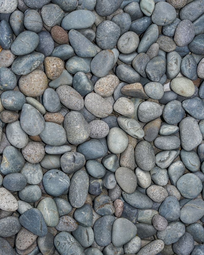 Smooth blue-grey river stones.